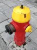 Standpipe red and yellow on tiles